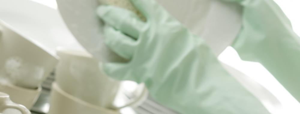 Washing dishes - hands with gloves in kitchen.jpg